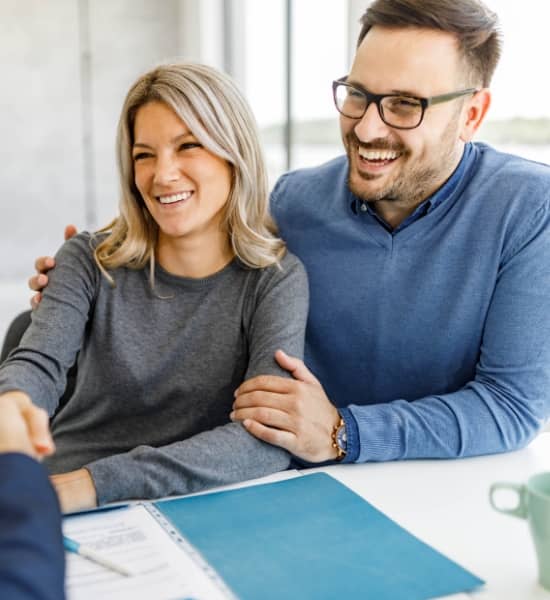 A couple signing up for a Health Savings Account