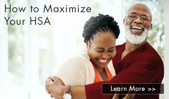Elderly couple hugging and laughing together